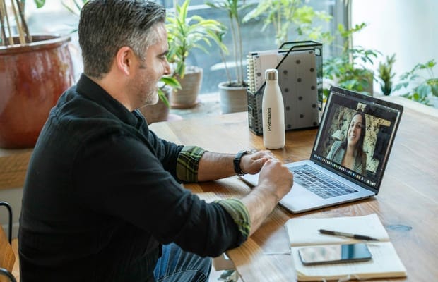 Man on a video call at his laptop